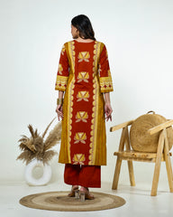 Navya-Rust Cotton Suit Set with Mustard Lotus Print, Mirror Work, Handwork Neckline & Tasselled Dupatta