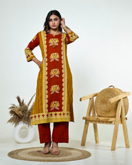 Navya-Rust Cotton Suit Set with Mustard Lotus Print, Mirror Work, Handwork Neckline & Tasselled Dupatta